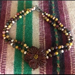 Handmade blown glass flower and beaded necklace